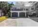Charming two-story townhome with a two-car garage and well-maintained landscaping at 202 S Lincoln Ave, Tampa, FL 33609
