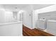 Hallway view of laundry room with modern washer and dryer at 202 S Lincoln Ave, Tampa, FL 33609