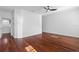 Spacious living room with hard floors and a modern ceiling fan at 202 S Lincoln Ave, Tampa, FL 33609