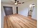 Spacious bedroom with wood look floors and ensuite bathroom at 2172 University S Dr, Clearwater, FL 33764