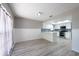Modern eat-in kitchen featuring stainless steel appliances, lots of natural light, and updated flooring at 2336 Windsor Oaks Ave, Lutz, FL 33549
