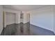 Bedroom with black tile flooring; washer and dryer located in closet at 2424 W Tampa Bay Blvd # I202, Tampa, FL 33607