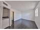 Bright room with tile floors and window, featuring washer and dryer appliance at 2424 W Tampa Bay Blvd # I202, Tampa, FL 33607