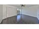 Clean bedroom with tile floors, closet, and balcony with great natural light at 2424 W Tampa Bay Blvd # I202, Tampa, FL 33607
