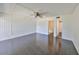 Spacious bedroom with tile floors, ceiling fan, and neutral walls at 2424 W Tampa Bay Blvd # I202, Tampa, FL 33607