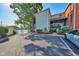 Exterior view of property featuring dedicated parking and waterfront gate access at 2424 W Tampa Bay Blvd # I202, Tampa, FL 33607