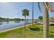 Waterfront view of docks, pool, and landscaping at 2424 W Tampa Bay Blvd # I202, Tampa, FL 33607