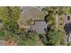 Birds eye view of the home highlighting roof, yard, and nearby street at 3025 50Th St S S St, Gulfport, FL 33707