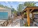 Cozy backyard with a covered gazebo, deck, and beautiful patio, perfect for entertaining guests or relaxing at 3025 50Th St S S St, Gulfport, FL 33707
