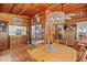 Dining room with wood paneling and a large chandelier at 3025 50Th St S S St, Gulfport, FL 33707