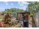 Backyard features a charming gazebo with an outdoor kitchen setup, ideal for entertaining and relaxation at 3025 50Th St S S St, Gulfport, FL 33707