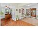 Open hallway showcases hardwood flooring and natural light, and integrates seamlessly with the home's open layout at 3025 50Th St S S St, Gulfport, FL 33707
