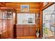 Cozy kitchen featuring white cabinets, stainless appliances and an eat-up bar open to the sunroom at 3025 50Th St S S St, Gulfport, FL 33707