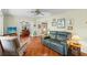 Bright living room boasting lots of natural light, hardwood floors, neutral paint, and comfortable seating at 3025 50Th St S S St, Gulfport, FL 33707