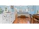 Spacious main bedroom featuring tile floors, blue walls, bright light and a full size bed at 3025 50Th St S S St, Gulfport, FL 33707