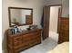 Bedroom with tile flooring, furniture set and a door to a closet at 31258 Park Ridge Dr, Brooksville, FL 34602