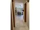 Hallway view leading to the living room, kitchen, and other areas of the home at 31258 Park Ridge Dr, Brooksville, FL 34602