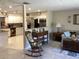 Open concept floor plan featuring a modern kitchen with stainless appliances at 31258 Park Ridge Dr, Brooksville, FL 34602