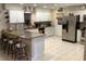 Bright and airy kitchen with white cabinets, granite counters, and stainless steel appliances at 31258 Park Ridge Dr, Brooksville, FL 34602
