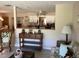 Spacious living area with tiled flooring, decorative furnishings and an open view of the kitchen space at 31258 Park Ridge Dr, Brooksville, FL 34602