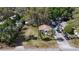 Aerial view of the house shows its large lot size at 38327 Palm Grove Dr, Zephyrhills, FL 33542