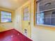 Sunroom features painted walls and windows at 38327 Palm Grove Dr, Zephyrhills, FL 33542