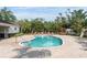 Relaxing community pool area surrounded by comfortable seating, perfect for hot days and socializing at 416 Durham Shore Ct, Apollo Beach, FL 33572