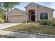 Well-maintained single-Gathering home with two-car garage and inviting front entrance at 416 Durham Shore Ct, Apollo Beach, FL 33572