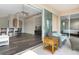 Open floor plan with living area flowing onto screened patio, connecting indoor and outdoor spaces with water view at 416 Durham Shore Ct, Apollo Beach, FL 33572