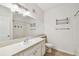 Bathroom featuring a large mirror, vanity, toilet, and shower/bathtub combination at 4207 S Dale Mabry Hwy # 12206, Tampa, FL 33611