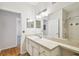 Bathroom with extended vanity and mirror, offering plenty of counter space at 4207 S Dale Mabry Hwy # 12206, Tampa, FL 33611