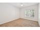 Well lit bedroom with carpet flooring at 4207 S Dale Mabry Hwy # 12206, Tampa, FL 33611
