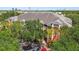 Inviting low-rise condo community with colorful accents, lush landscaping, and easy access to parking at 4207 S Dale Mabry Hwy # 12206, Tampa, FL 33611