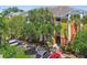 Attractive low-rise condo building features colorful accents, lush landscaping, and convenient parking at 4207 S Dale Mabry Hwy # 12206, Tampa, FL 33611
