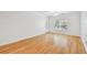 Bright living room with hardwood floors and a glass door leading to the outside at 4207 S Dale Mabry Hwy # 12206, Tampa, FL 33611