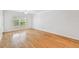 Bright living room with hardwood floors and natural light from a large window at 4207 S Dale Mabry Hwy # 12206, Tampa, FL 33611