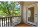 Private screened patio provides a comfortable outdoor space with serene views of lush greenery and partial views of the street at 4207 S Dale Mabry Hwy # 12206, Tampa, FL 33611