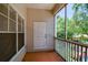 Private screened patio offers a seamless transition between indoor and outdoor living with views of mature trees at 4207 S Dale Mabry Hwy # 12206, Tampa, FL 33611