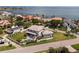 A high aerial shows a bayside home with lush surroundings and waterfront views at 4300 Bayshore Ne Blvd, St Petersburg, FL 33703