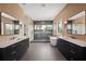 Spacious bathroom featuring dual vanities, walk-in shower, and modern fixtures at 4300 Bayshore Ne Blvd, St Petersburg, FL 33703