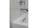 Modern bathroom sink with a sleek faucet and textured tile backsplash at 4300 Bayshore Ne Blvd, St Petersburg, FL 33703