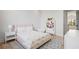 Charming bedroom featuring a pink bed, soft rug, and whimsical decorative items at 4300 Bayshore Ne Blvd, St Petersburg, FL 33703