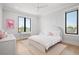 Bright bedroom features lots of natural light, hardwood floors, and neutral walls, creating a peaceful haven at 4300 Bayshore Ne Blvd, St Petersburg, FL 33703
