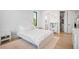 Bright bedroom features lots of natural light, hardwood floors, and neutral walls, creating a peaceful haven at 4300 Bayshore Ne Blvd, St Petersburg, FL 33703