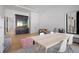 Spacious bonus room with hardwood flooring, media center and large table with chairs, perfect for entertaining at 4300 Bayshore Ne Blvd, St Petersburg, FL 33703