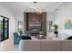 An inviting living room features stylish décor, a modern fireplace, and comfortable seating at 4300 Bayshore Ne Blvd, St Petersburg, FL 33703