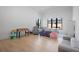 Spacious, bright playroom with hardwood floors, plenty of natural light, and ample space for fun and games at 4300 Bayshore Ne Blvd, St Petersburg, FL 33703