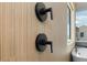 Modern bathroom shower fixtures featuring textured wall and freestanding bathtub at 4300 Bayshore Ne Blvd, St Petersburg, FL 33703