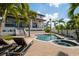 Luxurious backyard featuring a pool, spa, lounge chairs, and a spacious deck, perfect for outdoor living at 4300 Bayshore Ne Blvd, St Petersburg, FL 33703