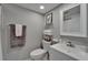 Cozy bathroom featuring a new vanity, toilet and soft grey walls at 4709 Puritan Cir # 702, Tampa, FL 33617